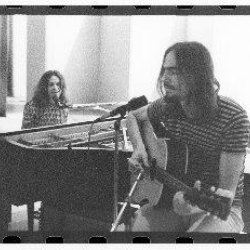 Carole and James. Photo by Jim McCrary from the collection of Lou Adler  